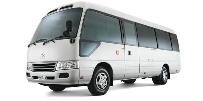 Image of Coaster bus car model, BookMe Car Rental Service, New Car Models Available for Rent, Affordable Prices.